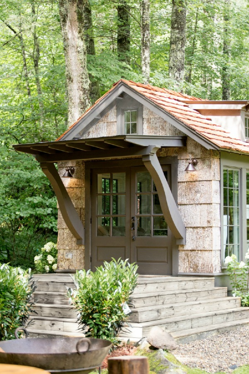 Jeffrey Dungan designed tiny house with finely crafted Low Country style -one of the cottages at The Retreat at Oakstone in Tennessee. #tinyhousedesign