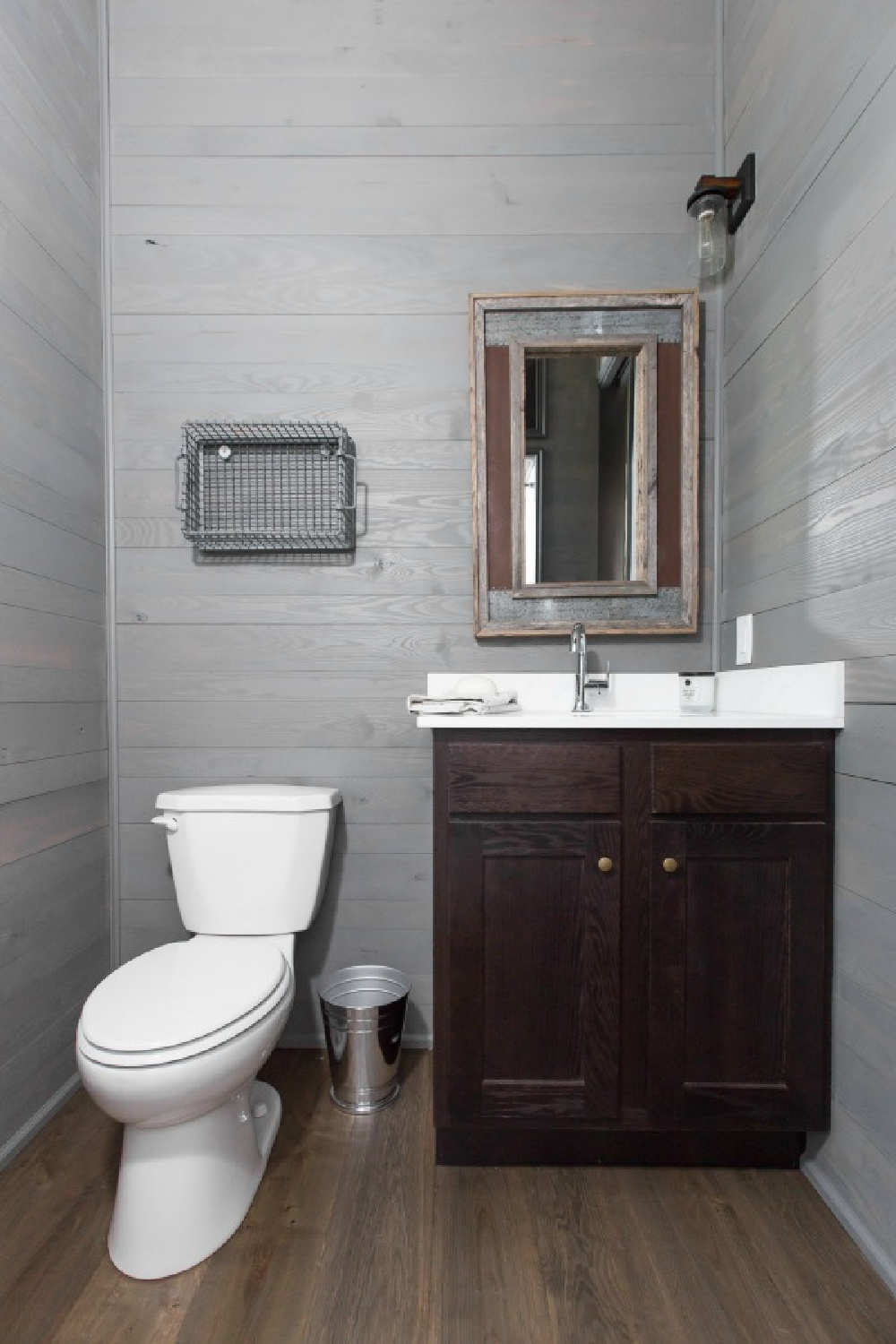 Bathroom in Jeffrey Dungan designed tiny house with finely crafted Low Country style -one of the cottages at The Retreat at Oakstone in Tennessee. #tinyhousedesign