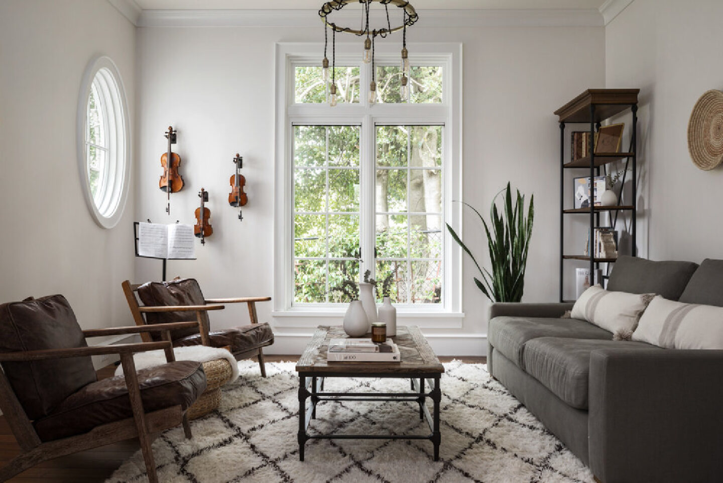 Violins on wall in beautiful French country home with interior design by Jenny Martin Design. #frenchcountryhome #interiordesign