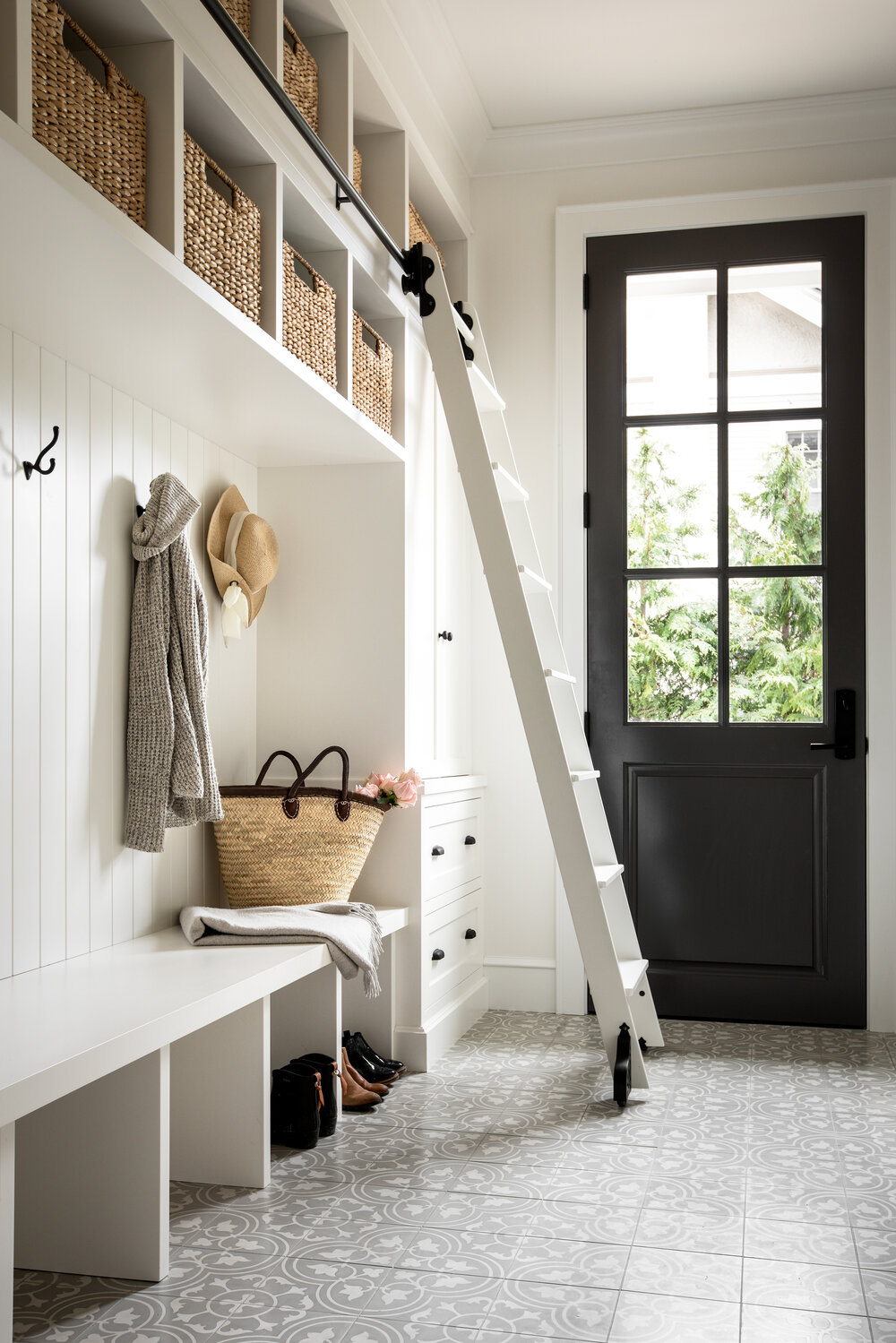 Mud room with built-ins in beautiful French country home with interior design by Jenny Martin Design. #frenchcountryhome #mudroom #interiordesign
