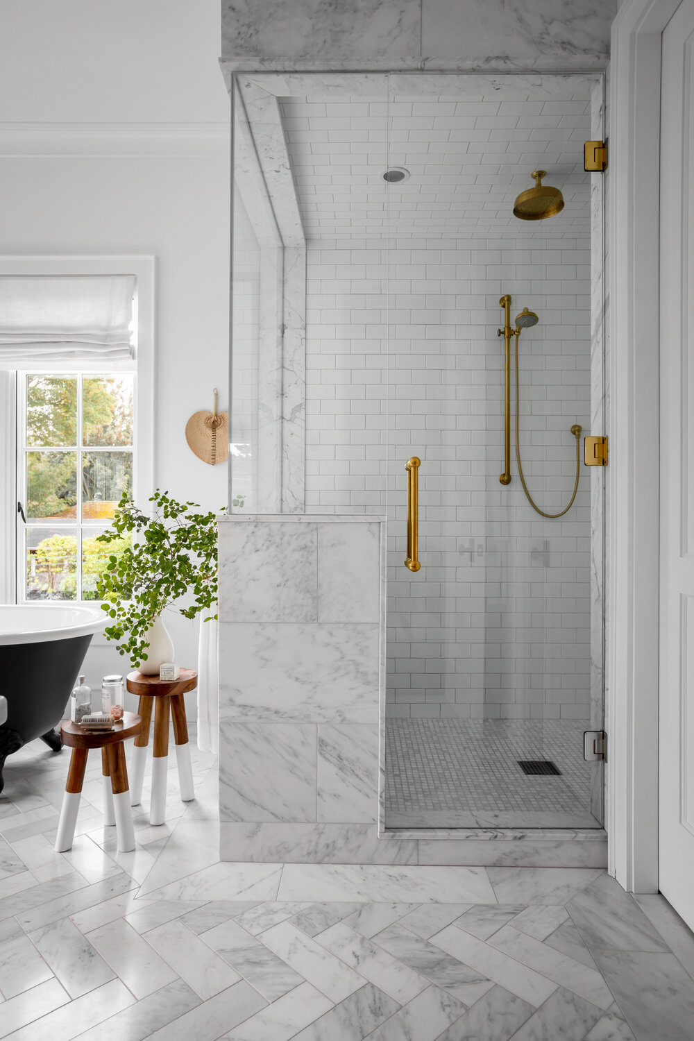 Marble shower in beautiful French country home with interior design by Jenny Martin Design. #frenchcountrybathroom #interiordesign