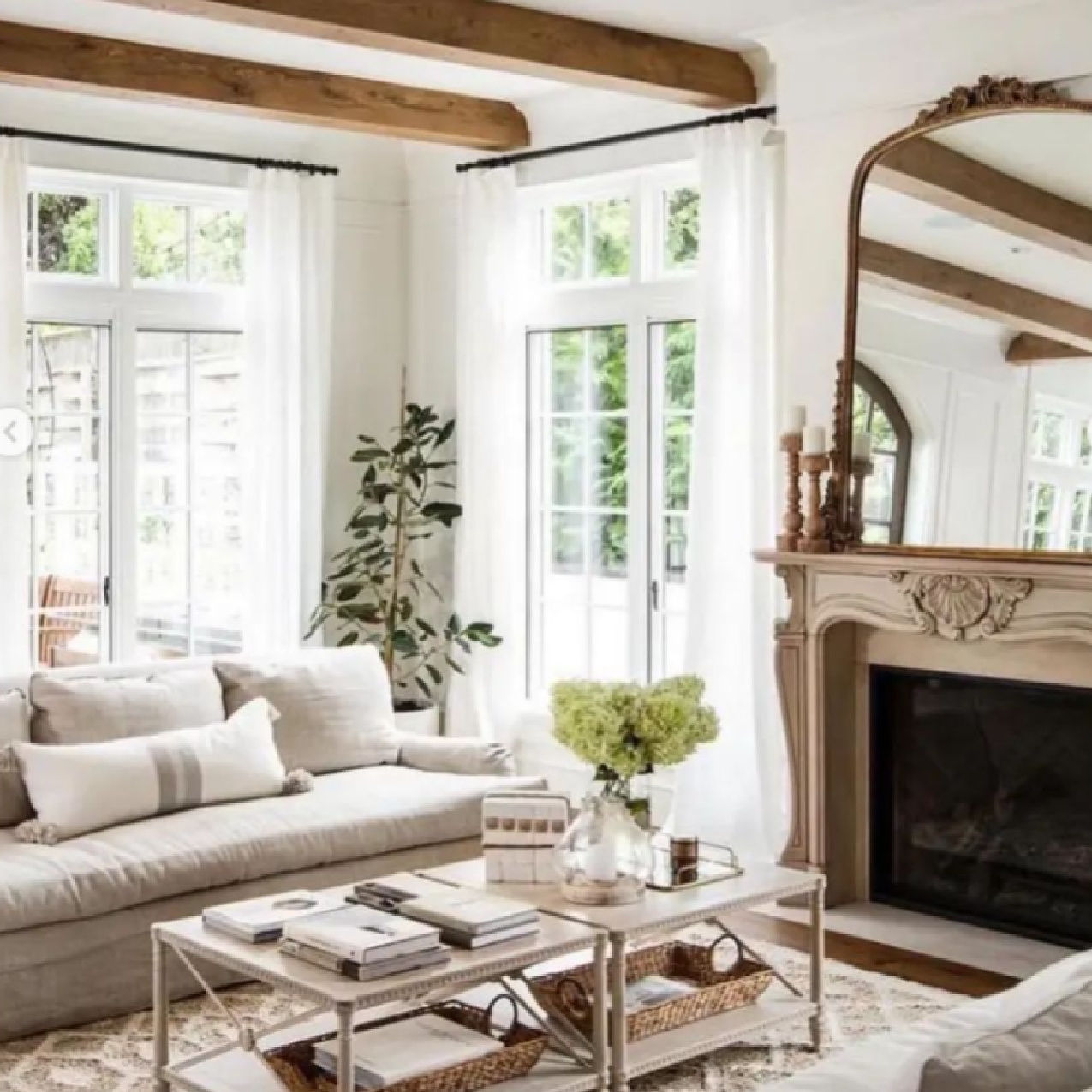 Neutral living room in beautiful French country home with interior design by Jenny Martin Design. #frenchcountryhome #livingrooms
