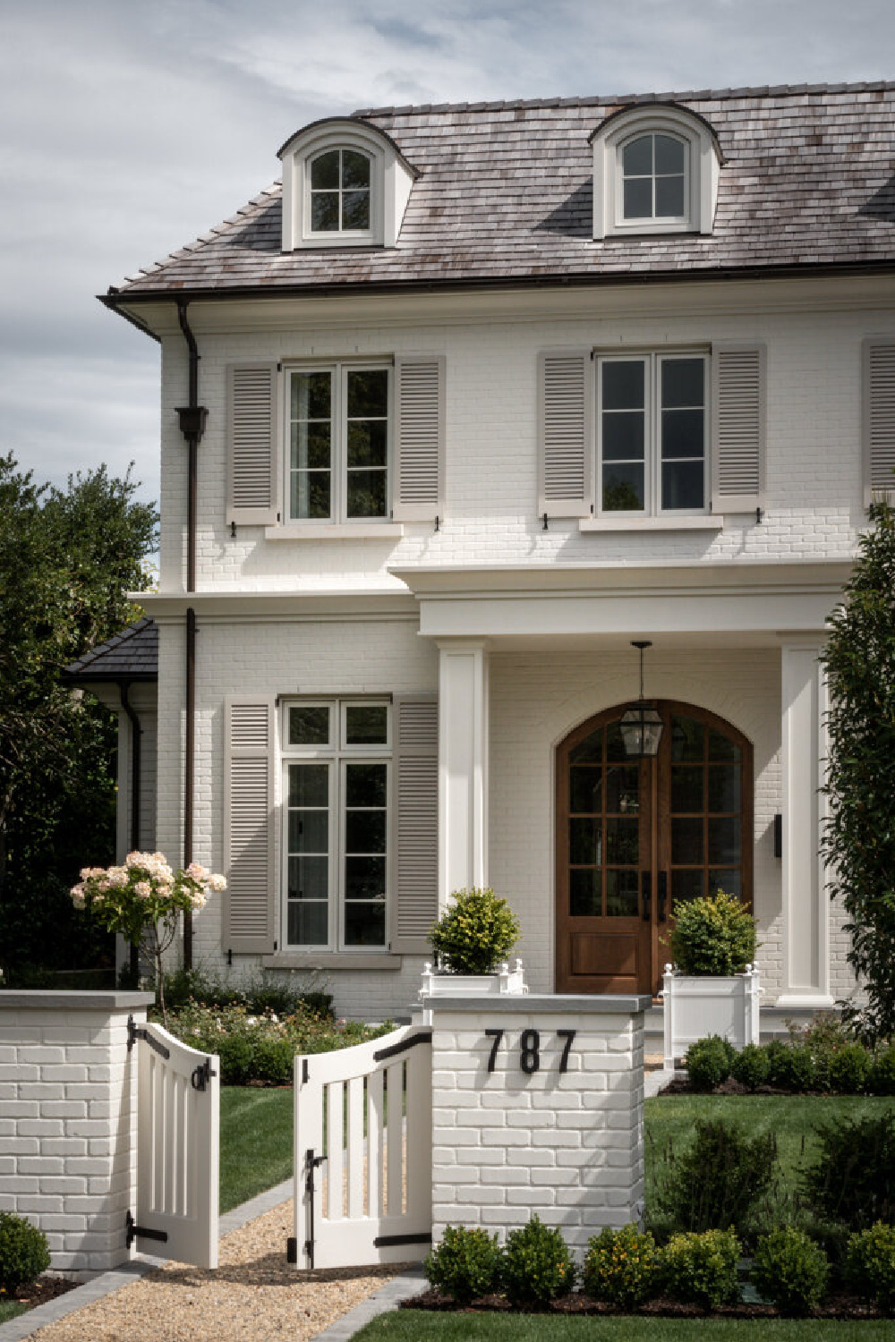 Exterior of beautiful French country home with interior design by Jenny Martin Design. #houseexteriors #frenchcountryhome #interiordesign