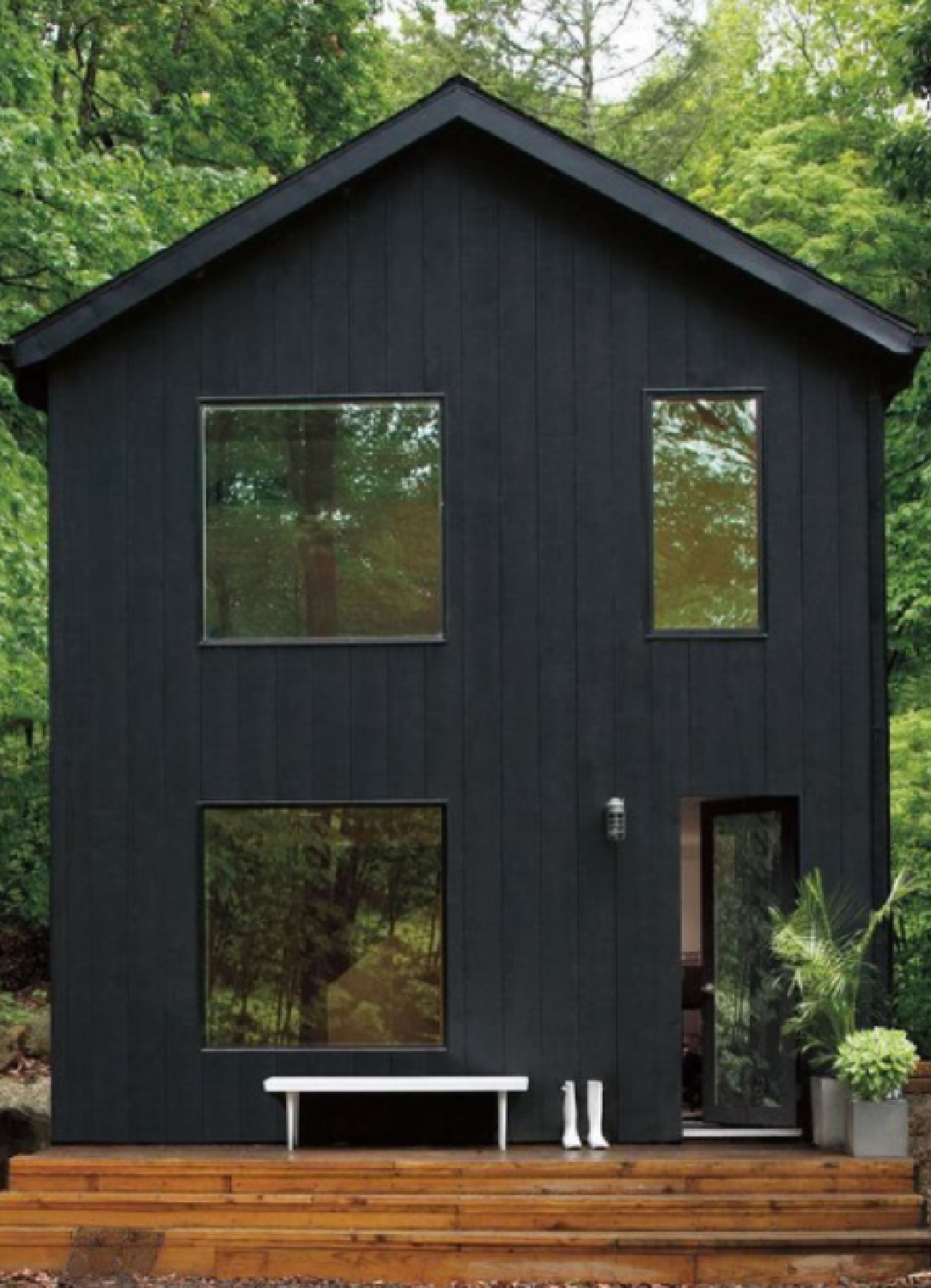 Beautifully dramatic black paint color on house exterior - @heathermariesanders. #blackhouses #blackpaintcolors