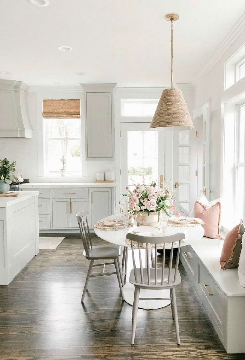 Elegant white farmhouse kitchen with Benjamin Moore Repose Grey cabinets, subway tile, gold accents, and reclaimed barn wood. Design: Finding Lovely. Timeless Tranquil White & Grey Kitchen Tour. Wall color: Benjamin Moore Chantilly Lace.