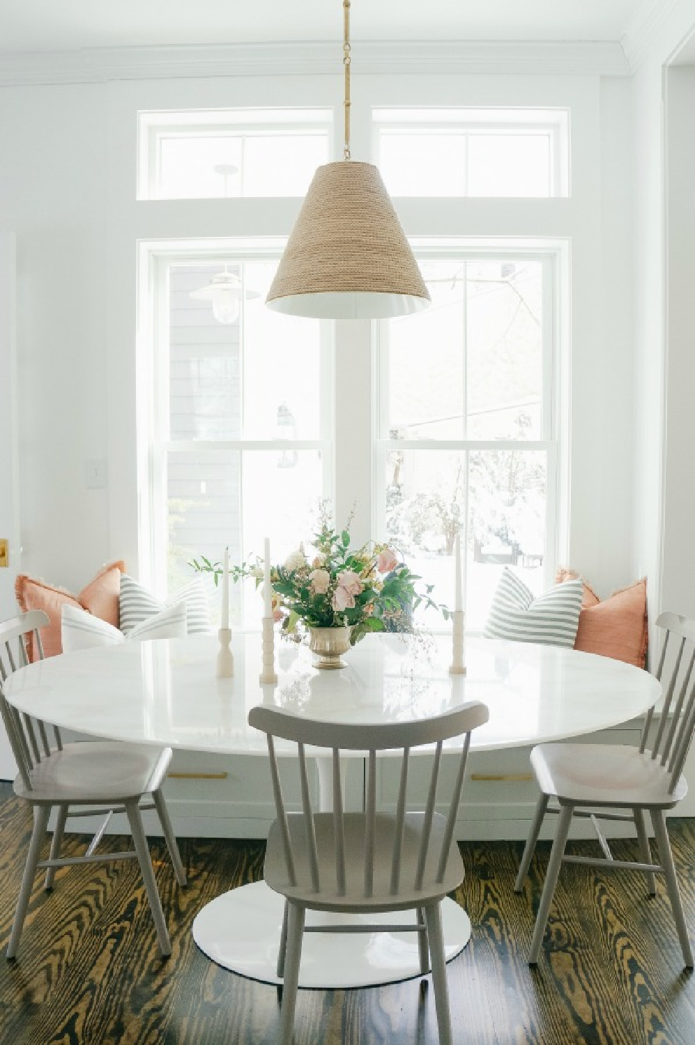 Elegant white farmhouse kitchen with Benjamin Moore Repose Grey cabinets, subway tile, gold accents, and reclaimed barn wood. Design: Finding Lovely. Wall color: Benjamin Moore Chantilly Lace.