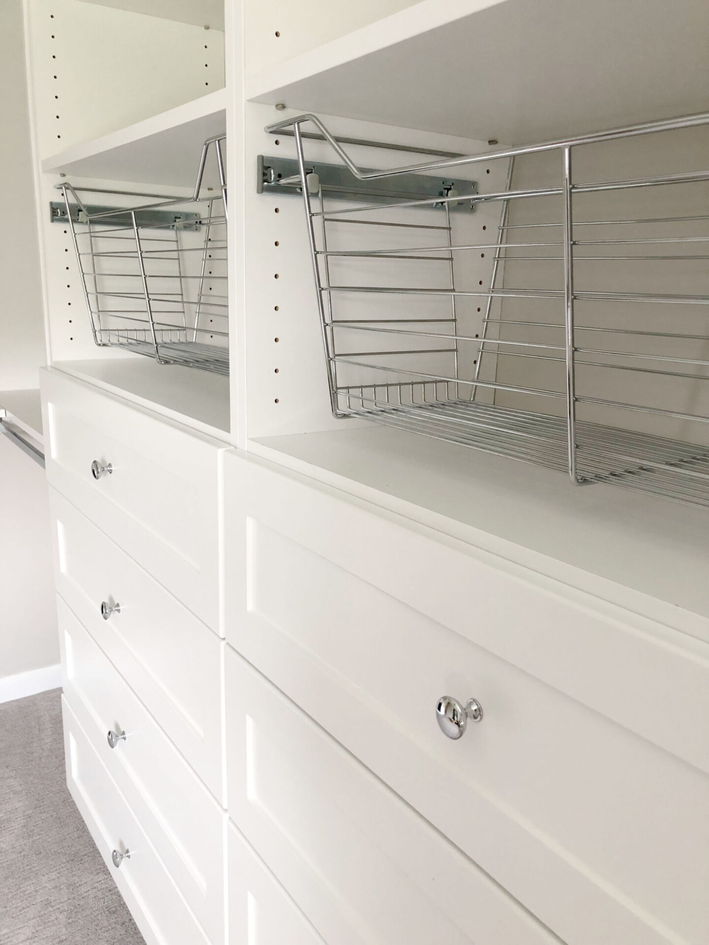 Detail of Modular Closets Vista shelves and chrome pull out drawers. - Hello Lovely