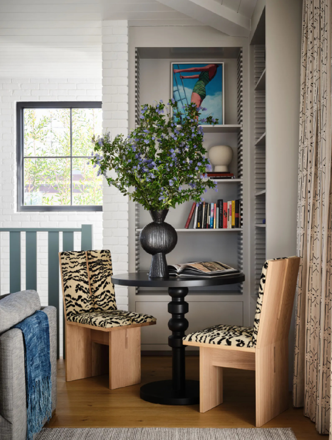 Glennon Doyle's home with Pavilion Gray (Farrow & Ball) paint color on bookshelves (photo: Douglas Friedman for AD) #farrowandballpaviliongray