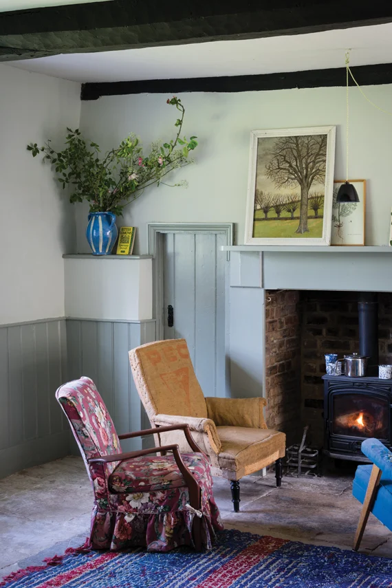 Pigeon (Farrow & Ball) strong blue gray pant color on trim in an English country living room. #farrowandballpigeon