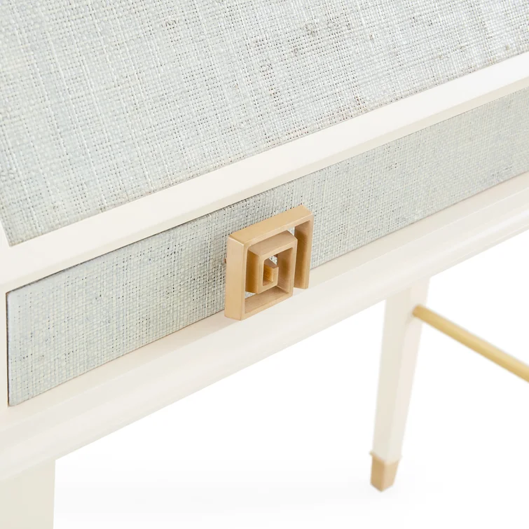 Detail of raffia-faced drawers on sky blue laquered secretary desk by Jonathan Adler