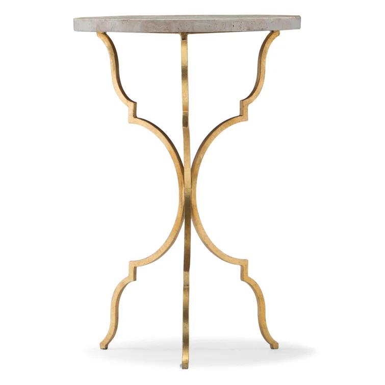 With its slender shaped iron legs in a gold finish and organic Travertine top and petite footprint, this metal-and-natural-stone accent table is the perfect piece of jewellery for your room.