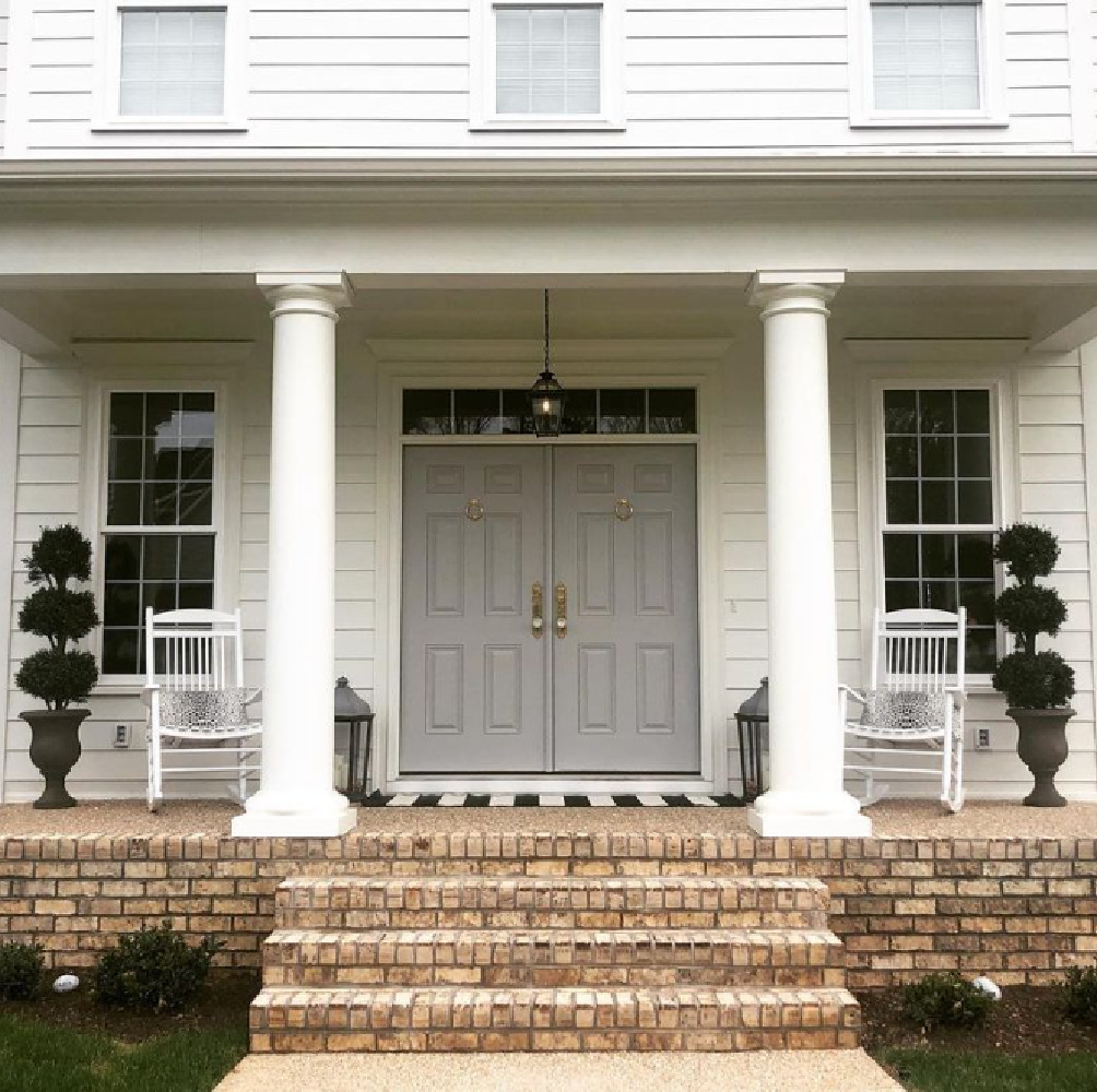 White Dove (Benjamin Moore) paint color on house exterior - @ourcolonialnewbuild. #whitehousepaintcolors #whitedove #benjaminmoorewhitedove
