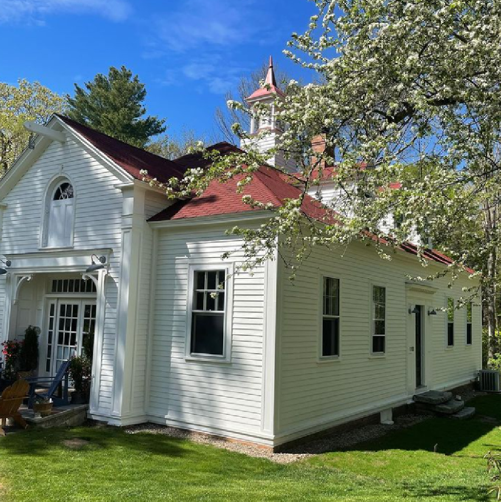 Carriage house exterior painted White Dove (Benjamin Moore). #houseexterior #whitehouses #whitedovepaint