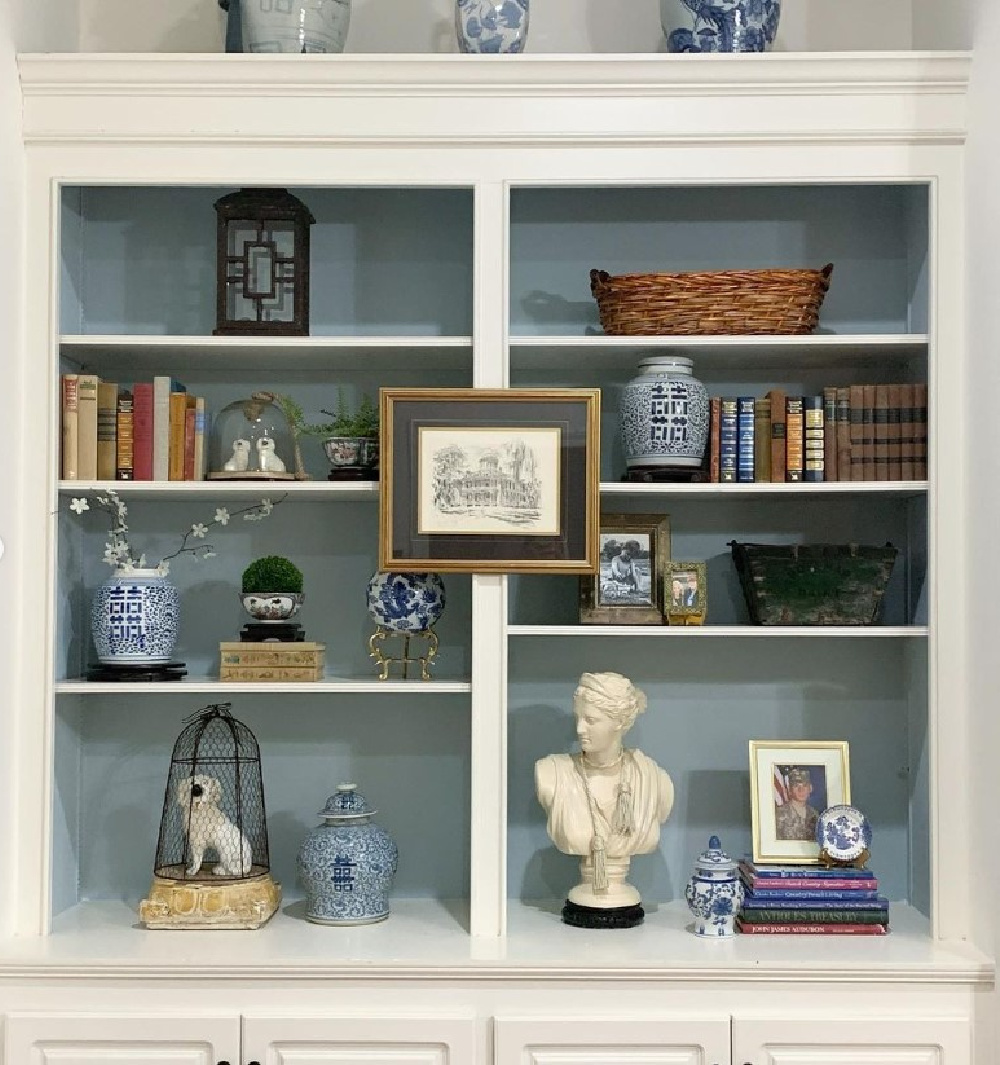 Benjamin Moore Smoke paint color inside book shelves - @thecarolinechateau. #benjaminmooresmoke #bluepaintcolors