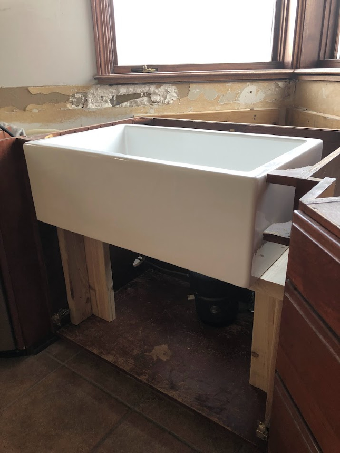Nantucket Sinks farm sink in kitchen under construction - Hello Lovely Studio. #farmsinks #kitchenrenovation