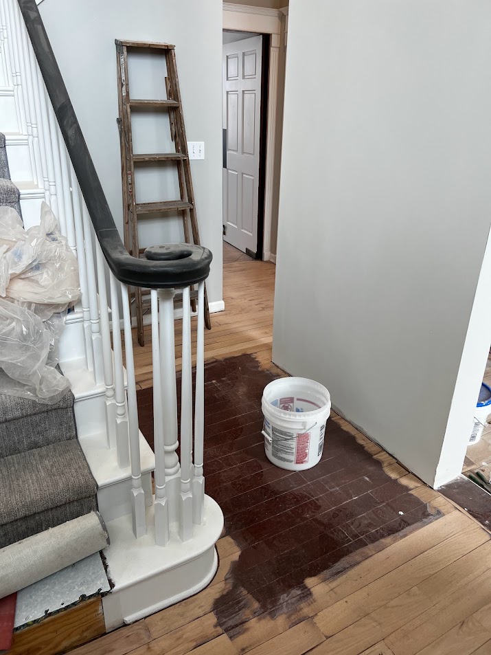 Foyer at Georgian renovation- hardwood floor refinishing