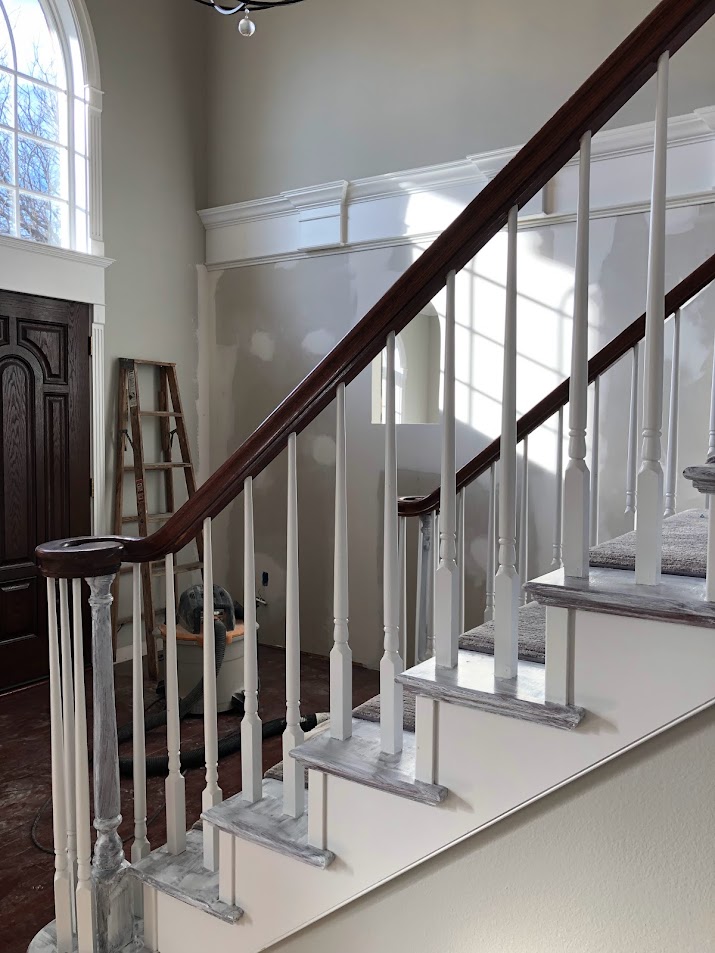 Staircase in foyer during Georgian renovation