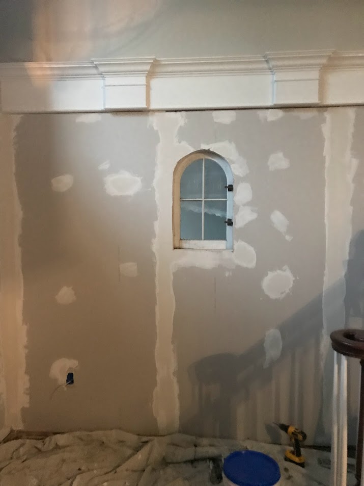 Foyer and living room wall construction during Georgian renovation