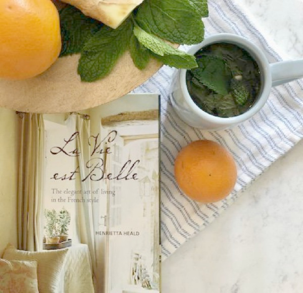 Ingredients for mint ginger orange tea on the counter (Viatera Minuet quartz) in my kitchen - Hello Lovely Studio.