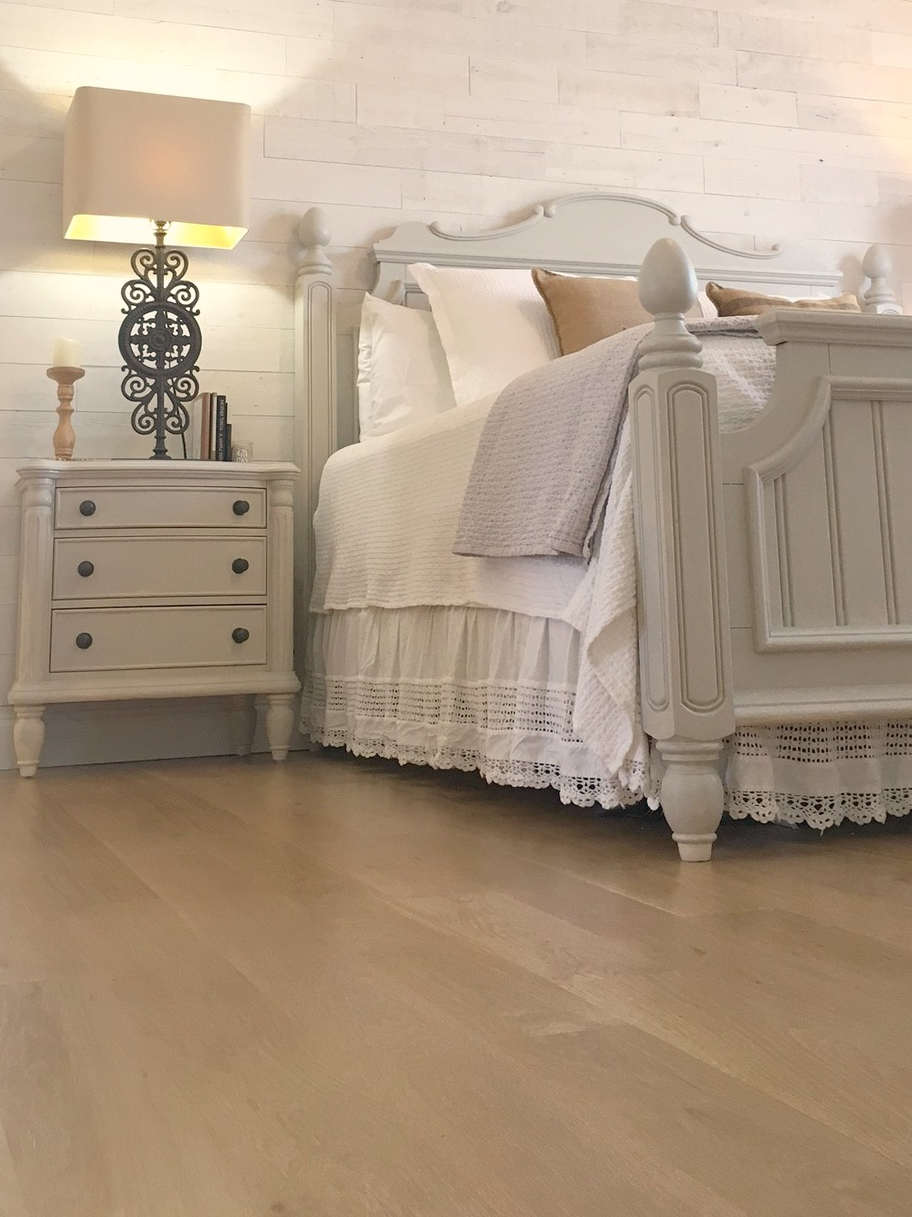 My serene European country inspired bedroom with Stikwood (Hamptons) statement wall, white oak flooring, and bead board detailed furniture - Hello Lovely Studio.