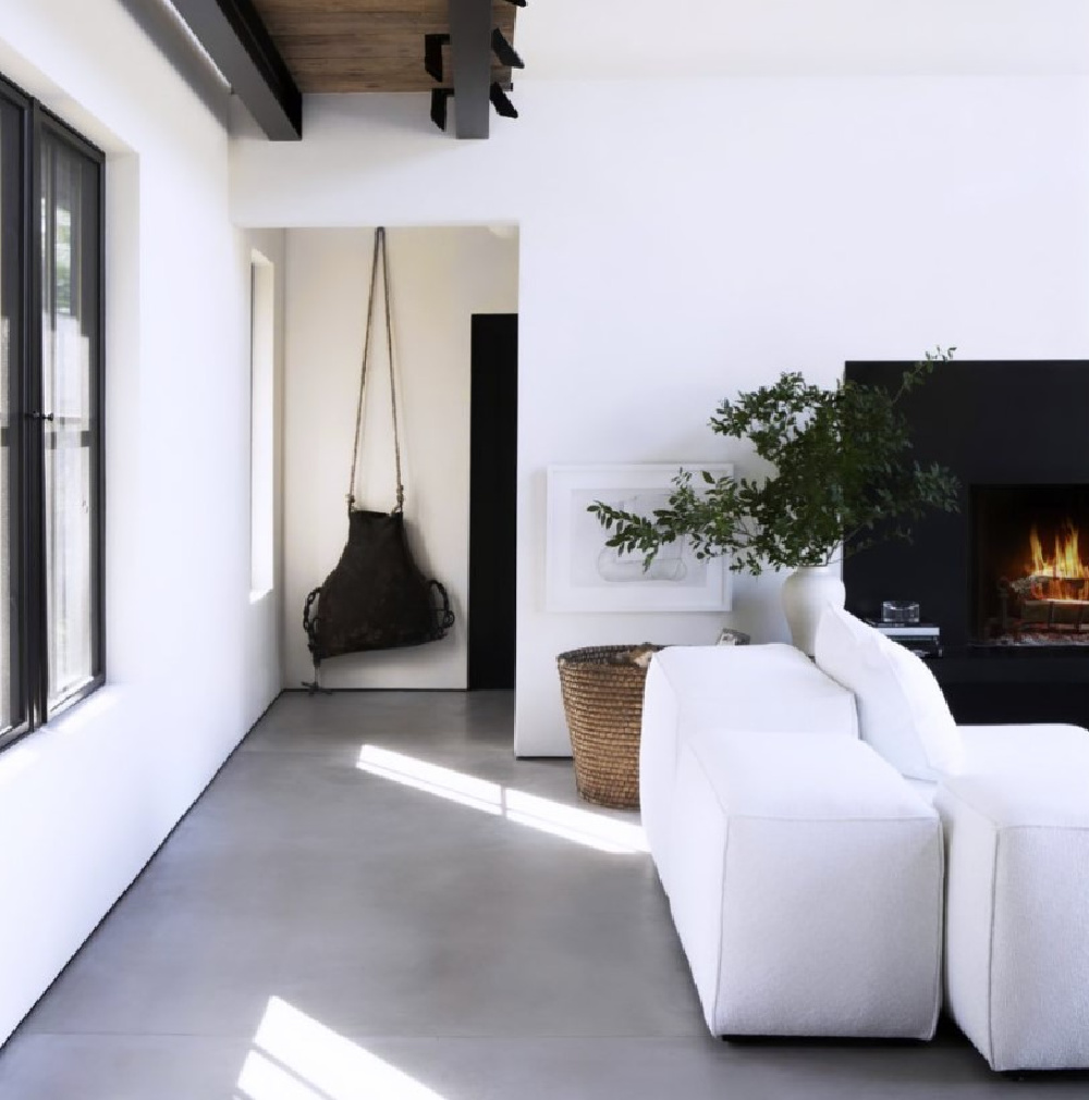 Gorgeous modern yet rustic interior designed by Michael del Piero with black and white.