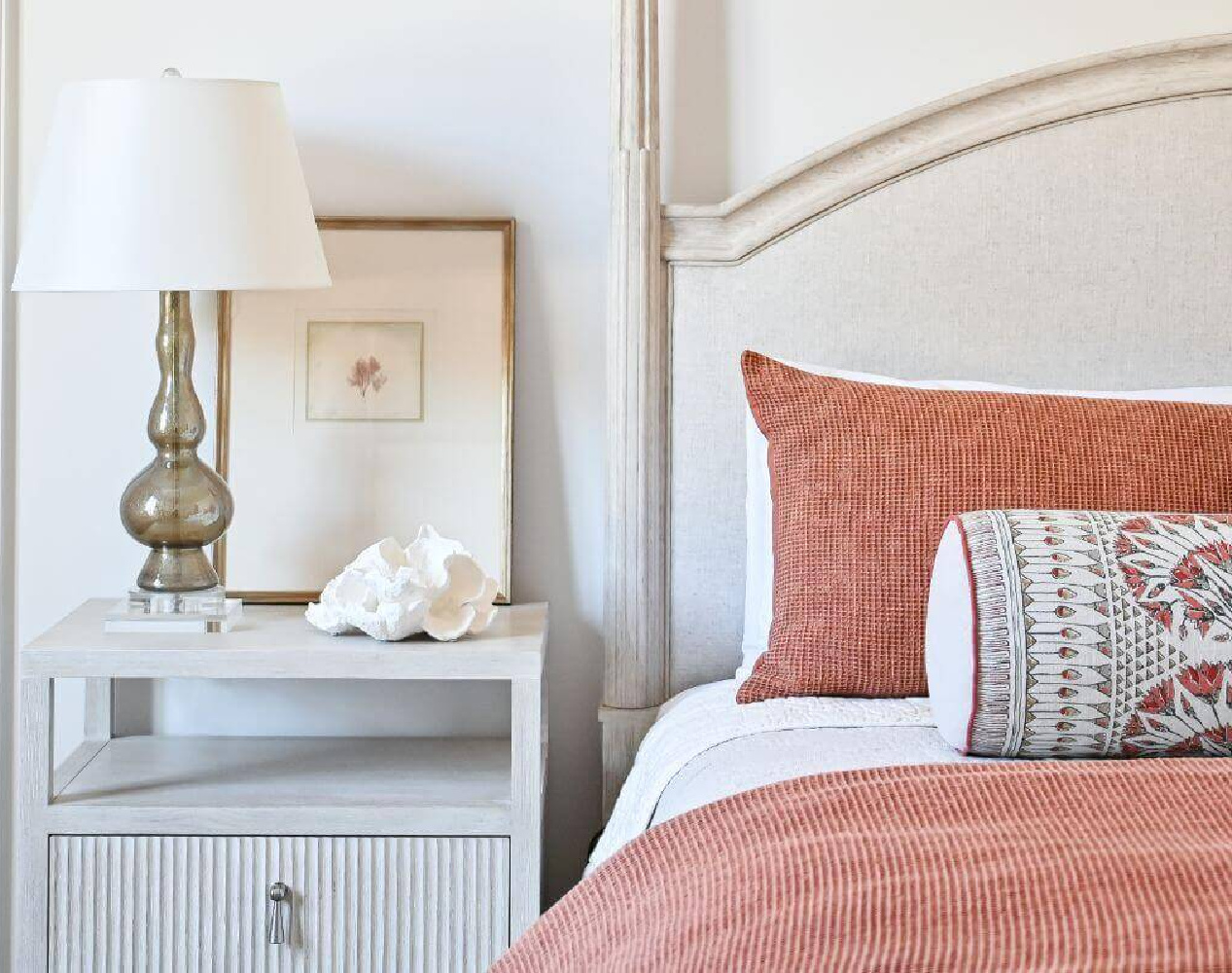 Beautiful modern French country bedroom with orange accents and pale furniture - Morningstar Builders. #frenchbedroom #modernfrench #bedroomdecor