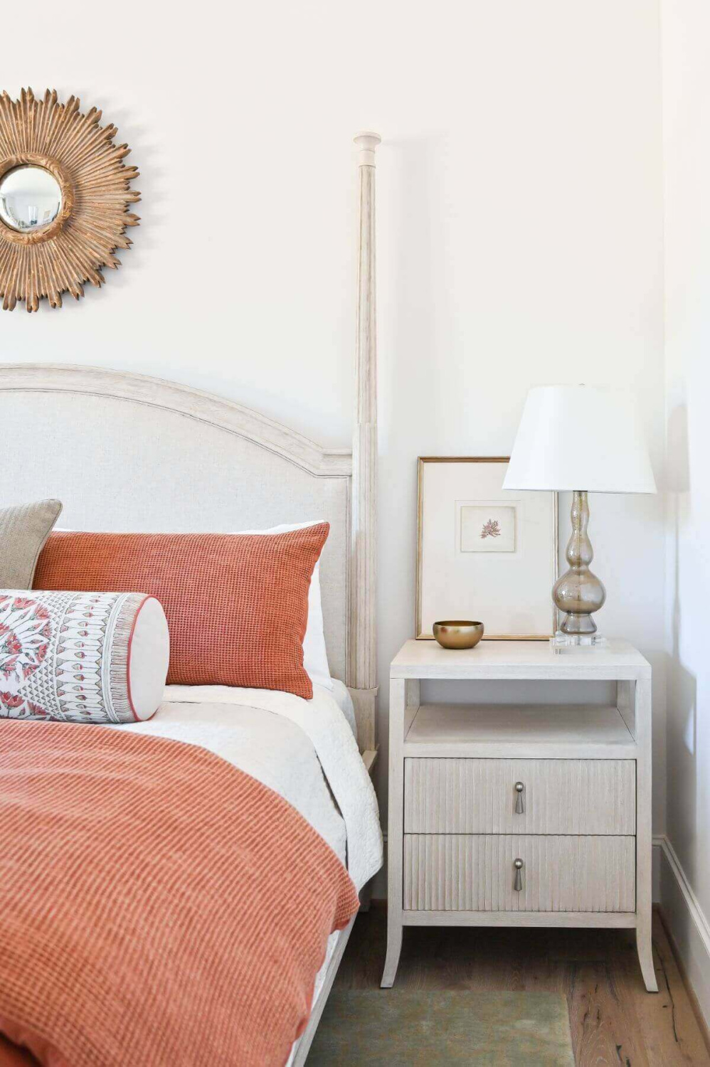 Beautiful modern French country bedroom with orange accents and pale furniture - Morningstar Builders. #frenchbedroom #modernfrench #bedroomdecor