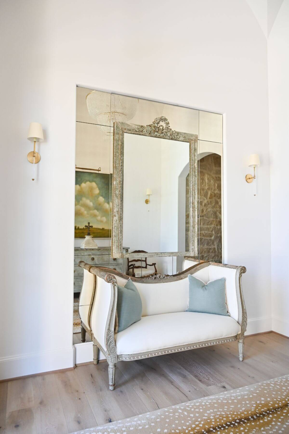 French country foyer with religious art and modern French decor - Morningstar Builders. #modernfrench #foyer #interiordesign