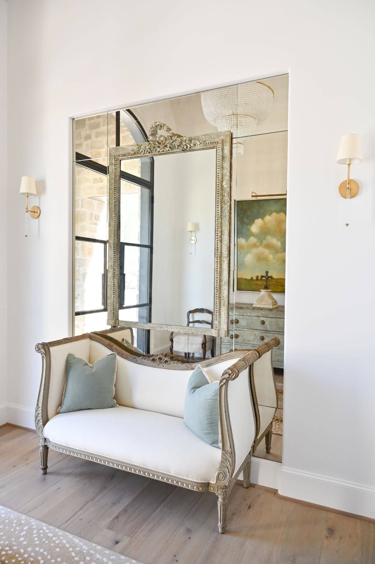 French country foyer with religious art and modern French decor - Morningstar Builders. #modernfrench #foyer #interiordesign