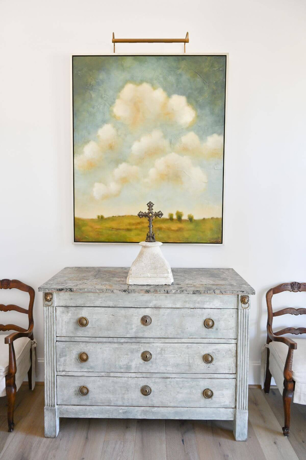 French country foyer with religious art and modern French decor - Morningstar Builders. #modernfrench #foyer #interiordesign