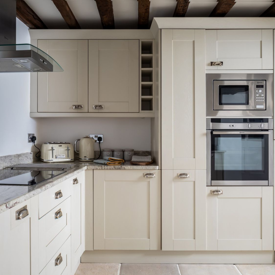 Kitchen with stone and beams in Abbots Cottage - a charming vacation rental in the Cotswolds. #cotswoldscottages