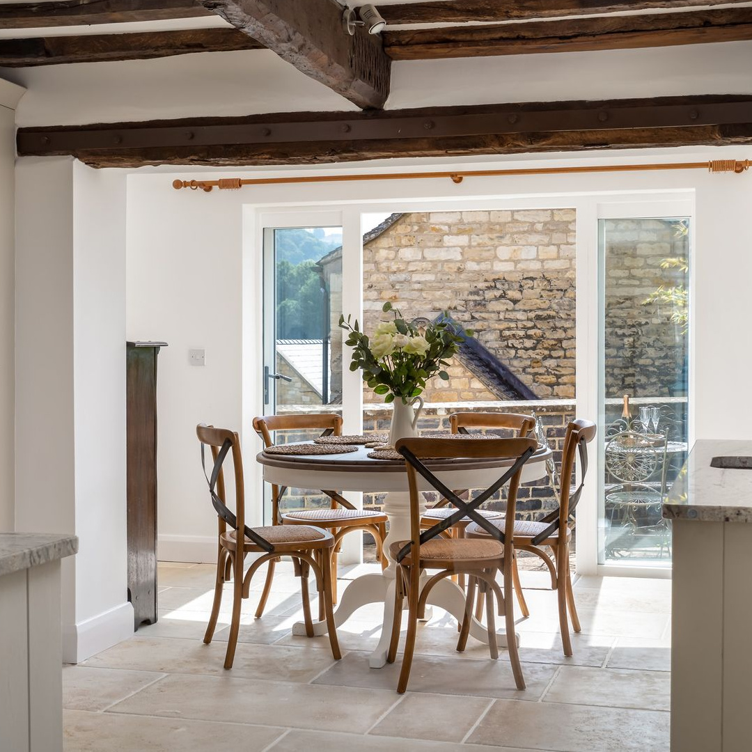 Kitchen with stone and beams in Abbots Cottage - a charming vacation rental in the Cotswolds. #cotswoldscottages
