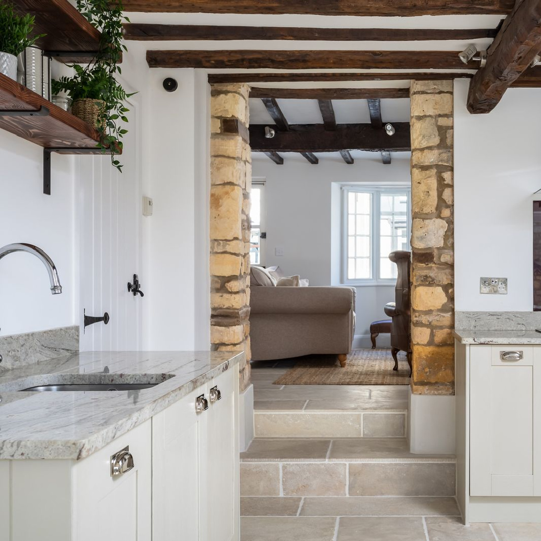 Kitchen with stone and beams in Abbots Cottage - a charming vacation rental in the Cotswolds. #cotswoldscottages