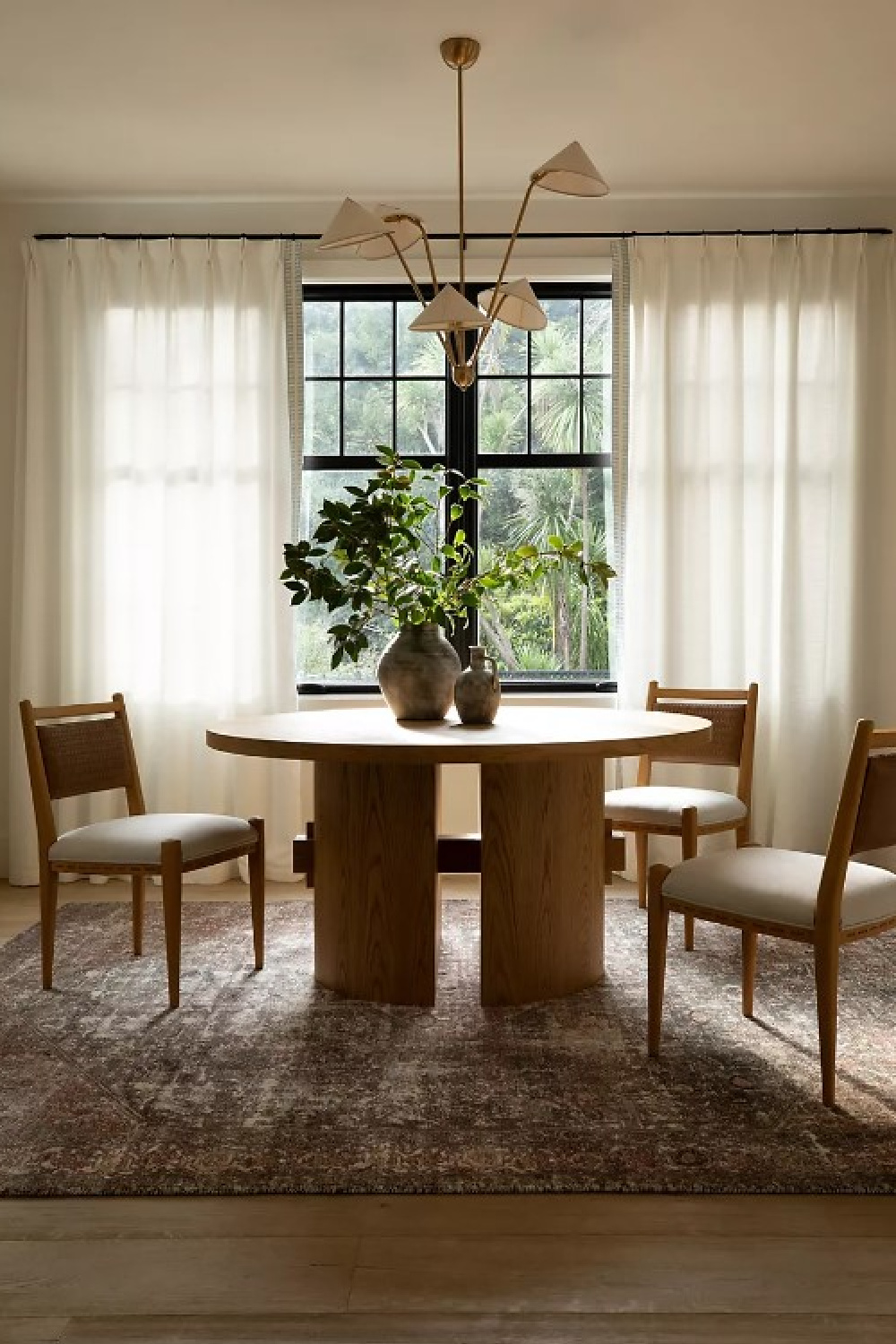 Beautiful California contemporary style dining room by Amber Lewis with Amphora Vase. #diningrooms #modernrustic