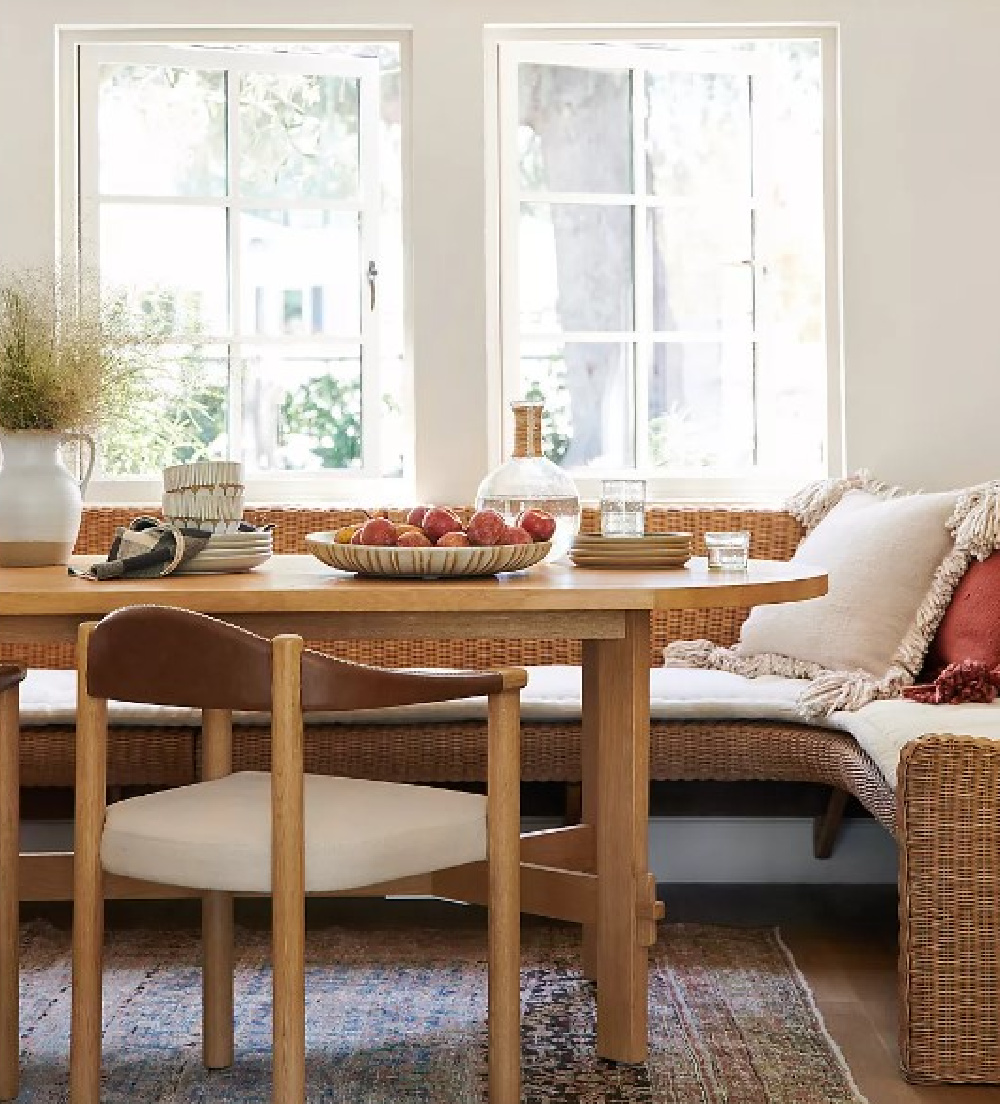 Lovely breakfast nook with modern rustic dining table (Henderson) designed by Amber Lewis. #breakfastnook #banquette #diningfurniture