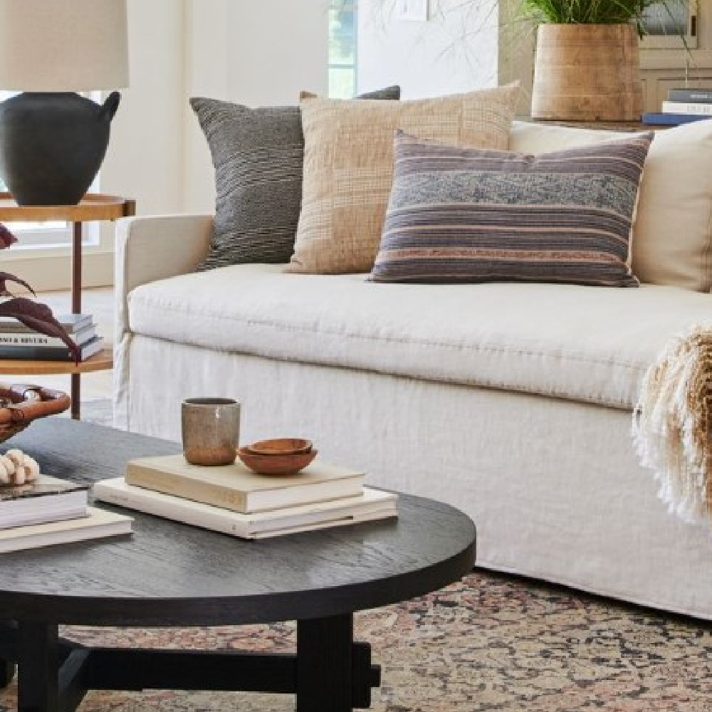 Keane slipcovered sofa by Amber Lewis. #slipcoveredsofas #californiastyle #modernrustic