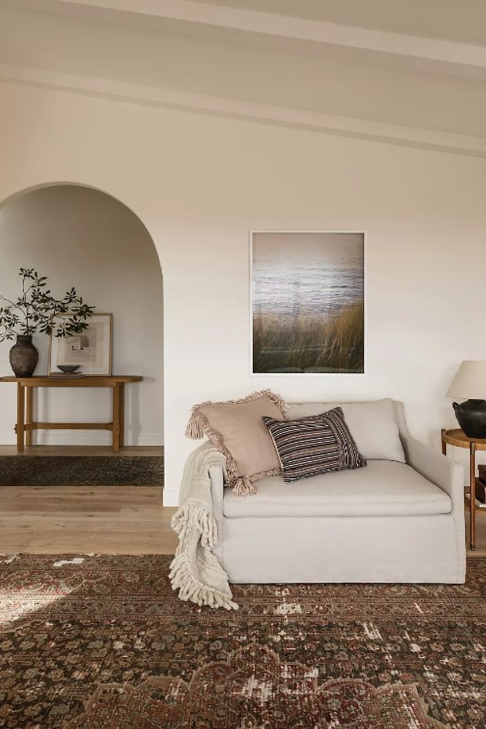 Beautiful slipcovered chair (Keane) with Cabin Throw Blanket by Amber Lewis. #modernrustic #livingroomfurniture