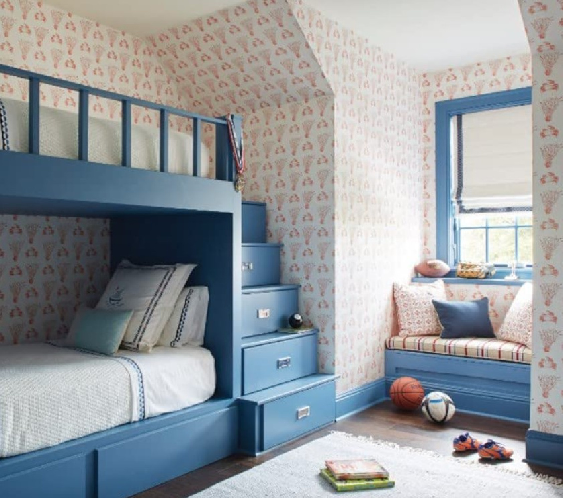 Blue bunks with drawer steps to top bunk - from The Bunk Bed Book by Laura Fenton (Gibbs Smith, 2022). #bunkbeds #custombunkbeds