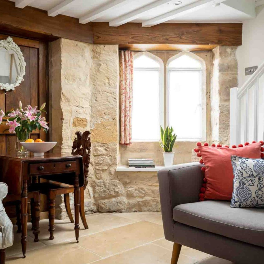 Cotswold cottage stone walls and wood beams - Butterrow Gate. #cotswoldcottage