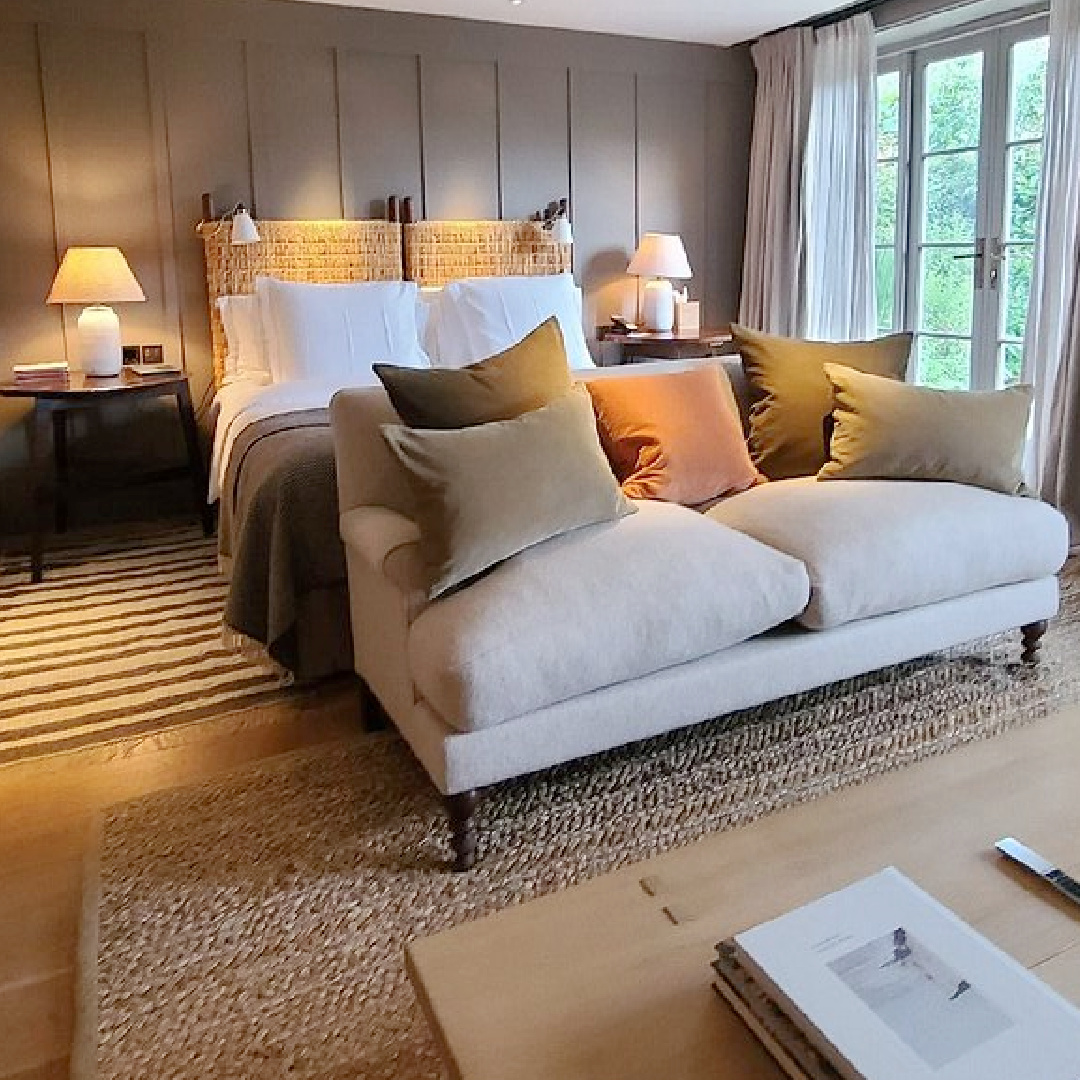 Heckfield Place (Hampsire, England) cozy yet luxurious bedroom with restful natural moody colors and English countryside charm - design by Ben Thompson. #heckfieldplace #interiordesign