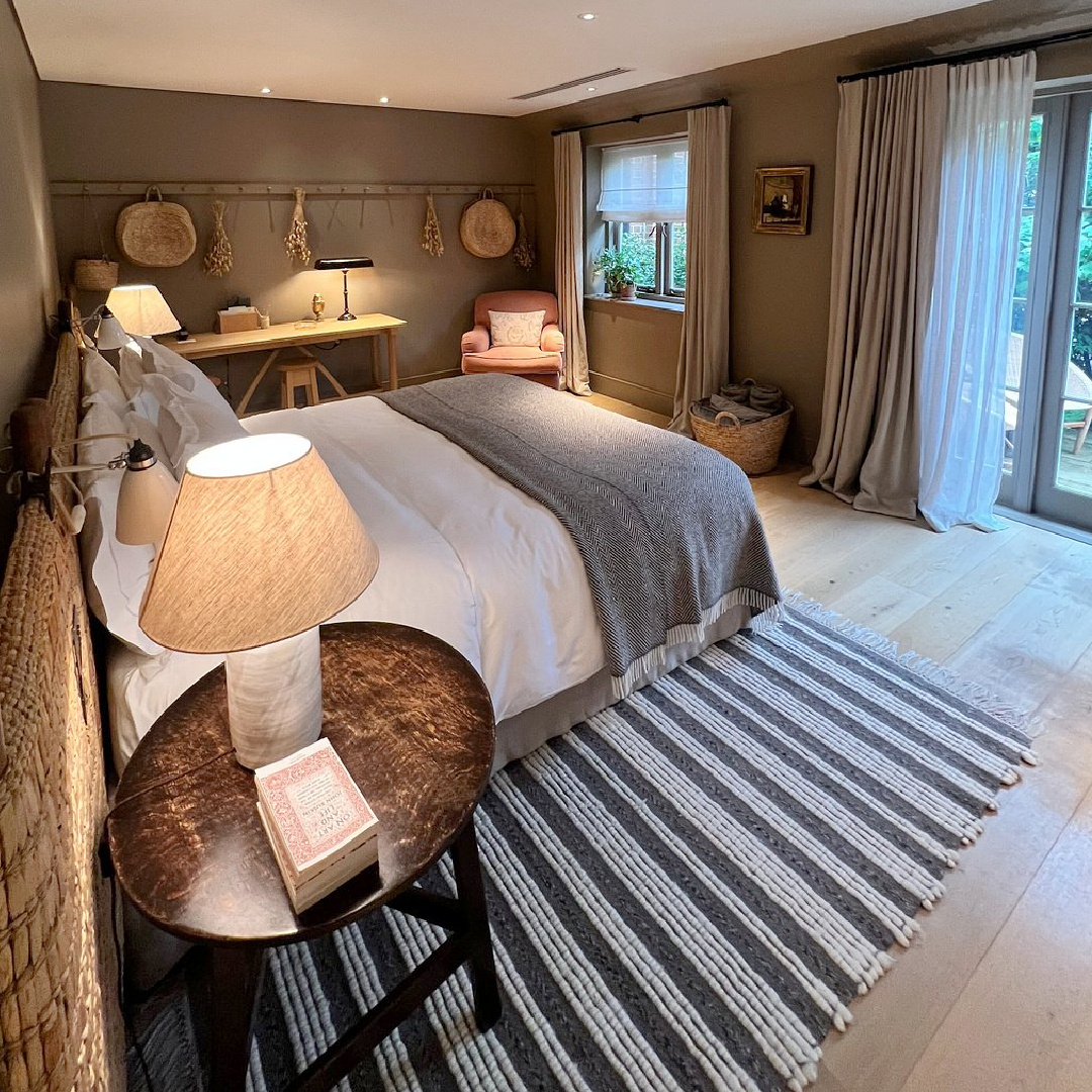 Heckfield Place (Hampsire, England) cozy yet luxurious bedroom with restful natural moody colors and English countryside charm - design by Ben Thompson. #heckfieldplace #interiordesign