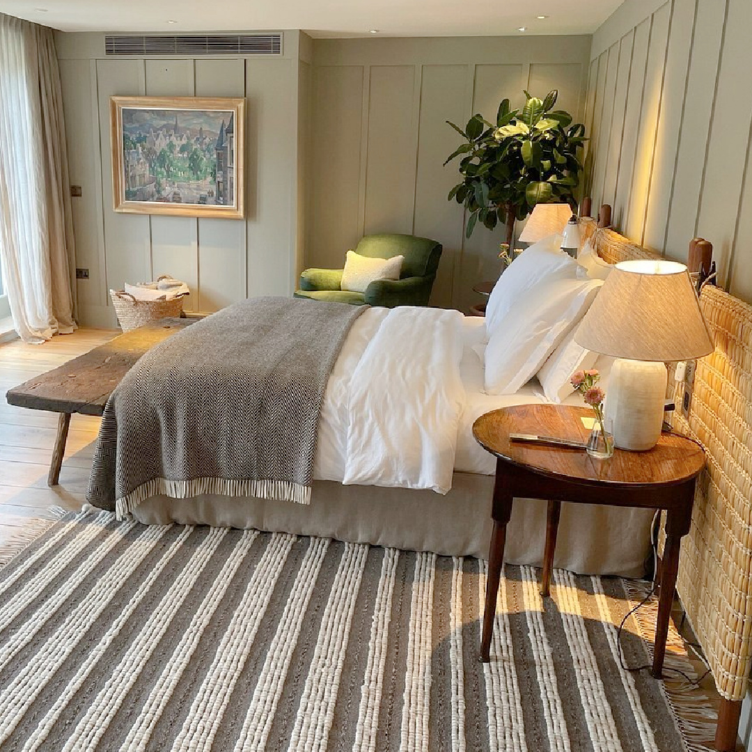 Heckfield Place (Hampsire, England) cozy yet luxurious bedroom with restful natural moody colors and English countryside charm - design by Ben Thompson. #heckfieldplace #interiordesign