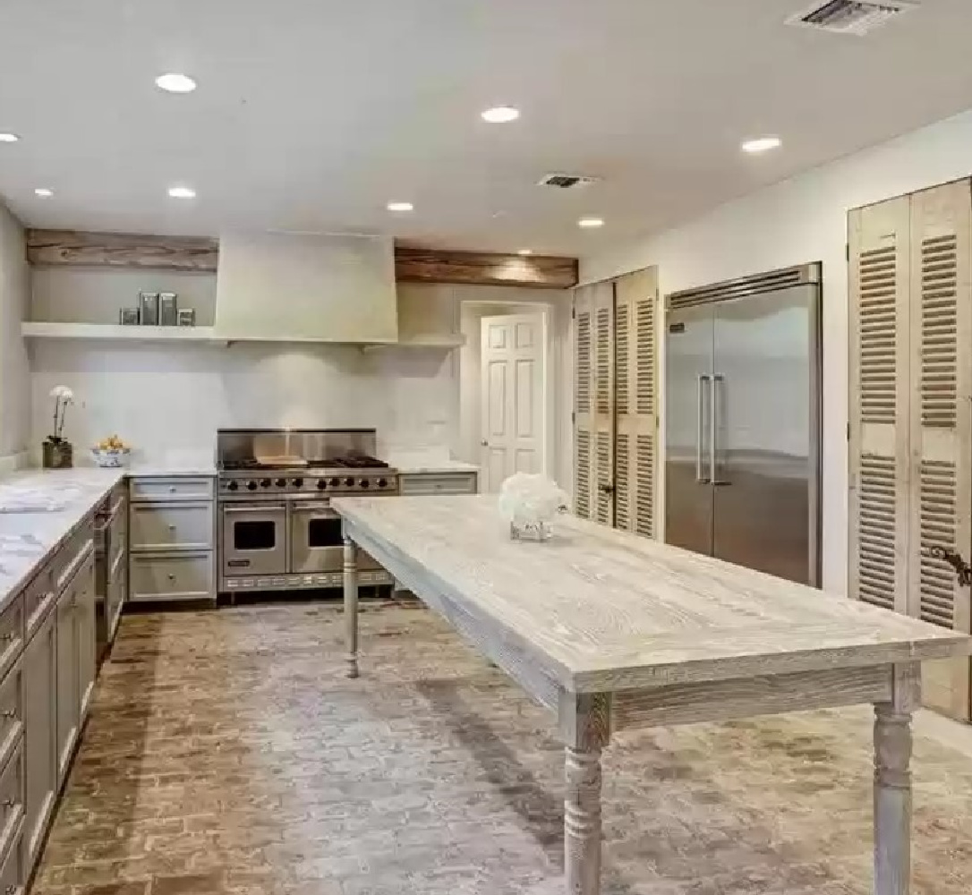 Modern French kitchen with rustic finishes and pale color palette in Houston. #modernfrench #kitchendesign