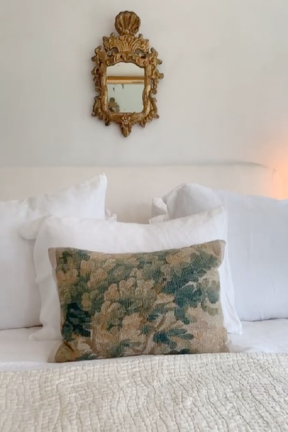 Serene modern French farmhouse bedroom at Patina Farm with white linen bedding, Swedish bedside tables, and design by Brooke Giannetti - Velvet and Linen. #patinafarm #modernfrenchbedroom