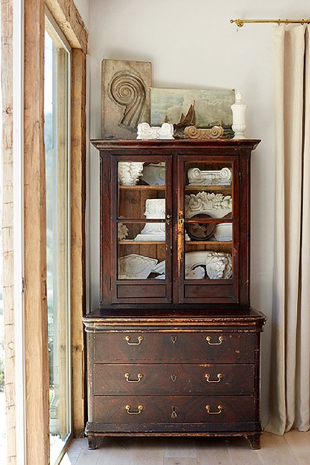 Antique cupboard with art and antiques - Patina Farm (Brooke Giannetti) European country farmhouse in Ojai. #patinafarm #oldworldstyle #antiquecabinets