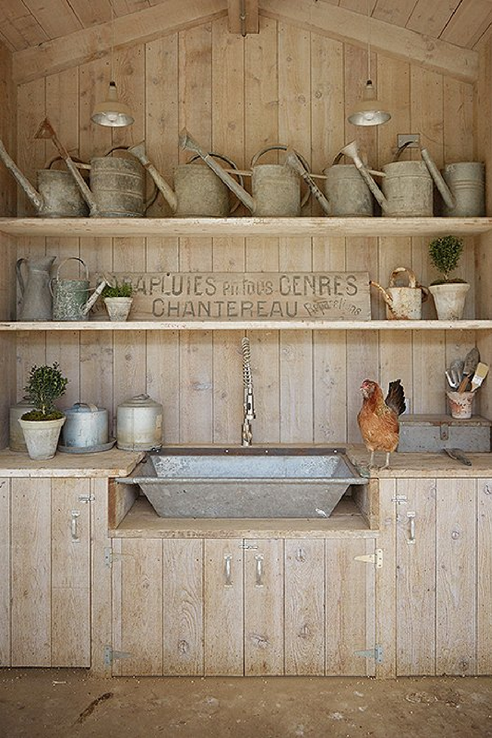 Chicken coop with vintage watering cans - Patina Farm (Brooke Giannetti) European country farmhouse in Ojai. #patinafarm #chickencoop #modernfarmhouse