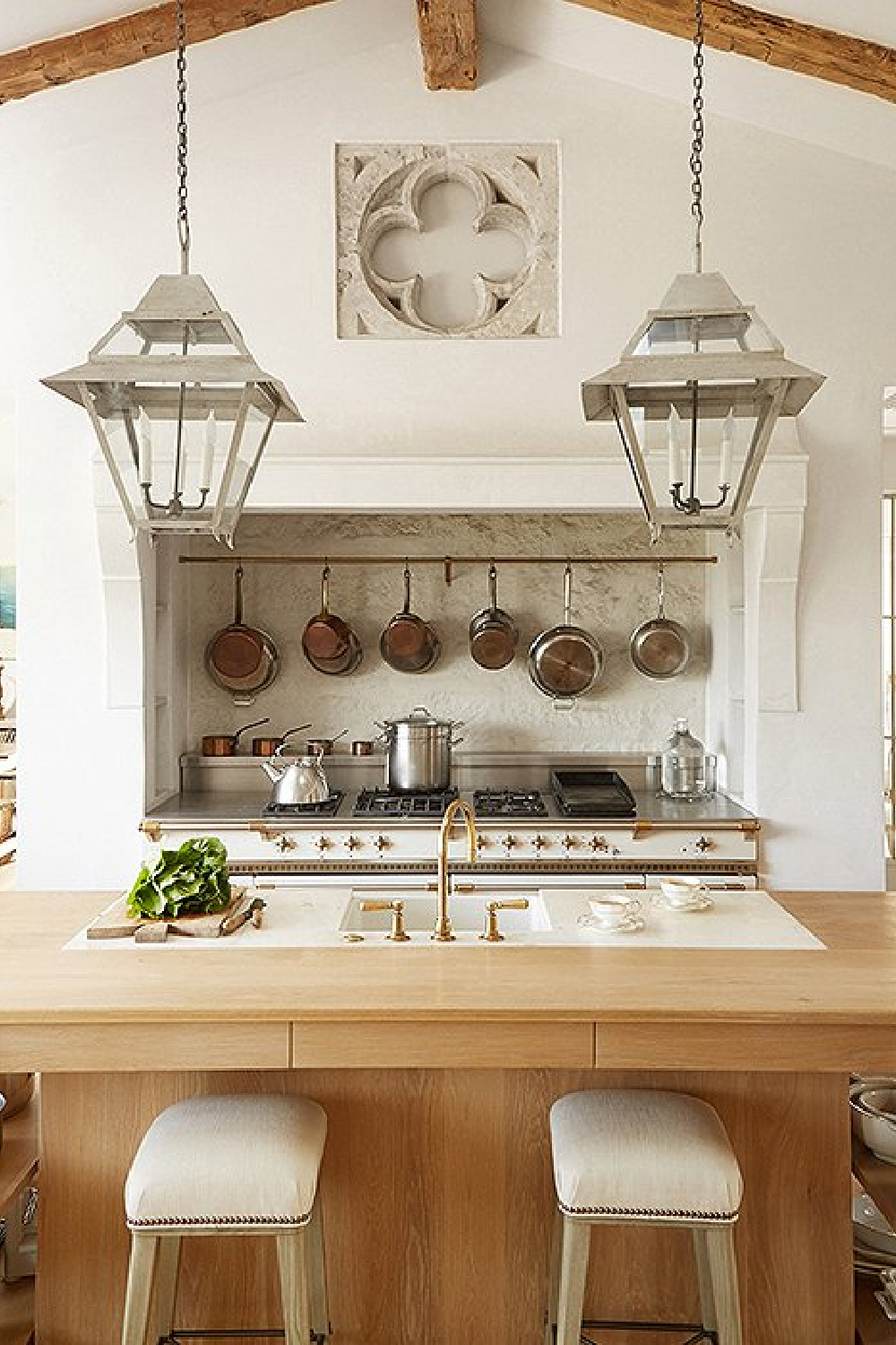 Lacanche range and limestone mantel in kitchen - Patina Farm (Brooke Giannetti) European country farmhouse in Ojai. #patinafarm #vintagemodern #modernrustic #frenchkitchens