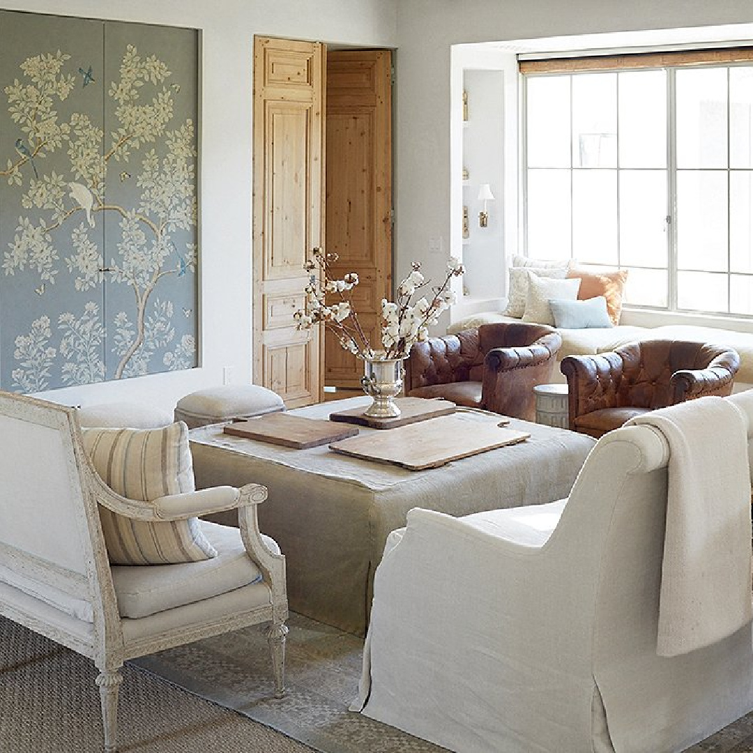 Gracie Studio sophisticated chinoiserie blue handpainted wallpaper to conceal a TV at Patina Farm - Brooke Giannetti.