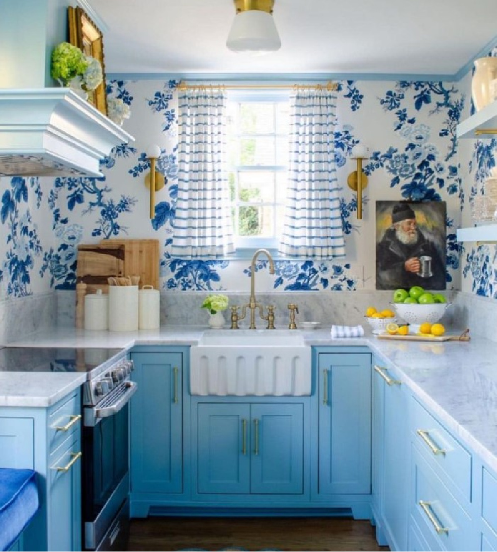 Charming turquoise blue kitchen cabinets and range hood with blue floral wallpaper - Shannon Meyer Roberts. #bluekitchens #turquoisecabinets