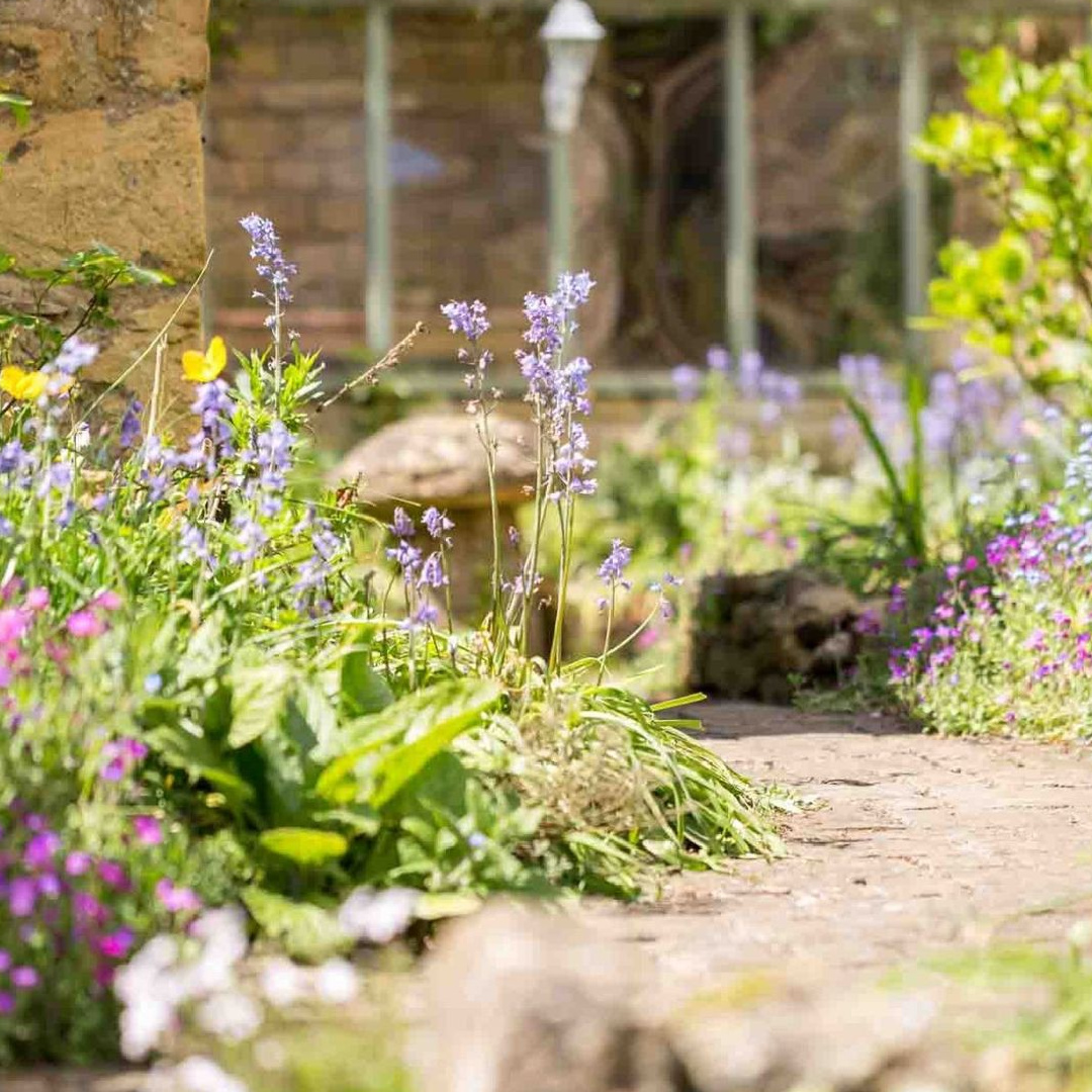 Terraced garden at Stanley Cottage - a charming Cotswolds cottage vacation rental.